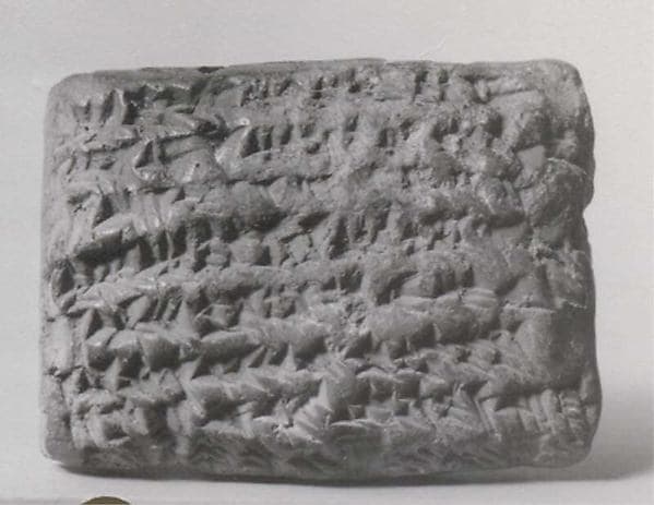 Cuneiform tablet impressed with cylinder seal: promissory note for silver · Achaemenid · ca. 515 BCE · Clay